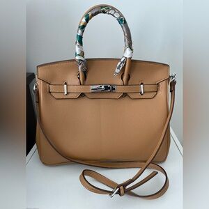 Faux leather caramel tote with faux hardware and twilly. Very good condition.